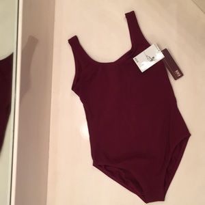 Girls small burgundy tank leotard